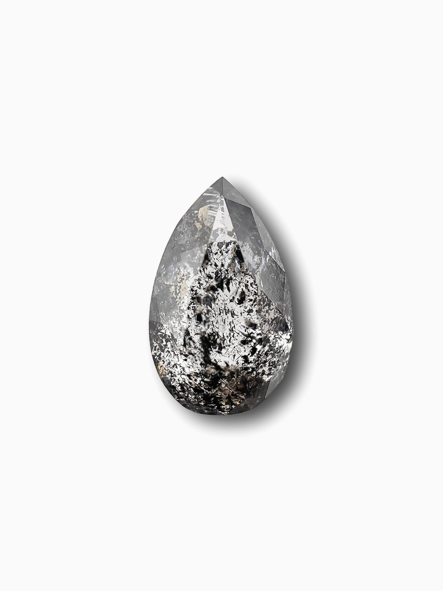 sustainable lab-grown pear shaped salt pepper diamond on a white background