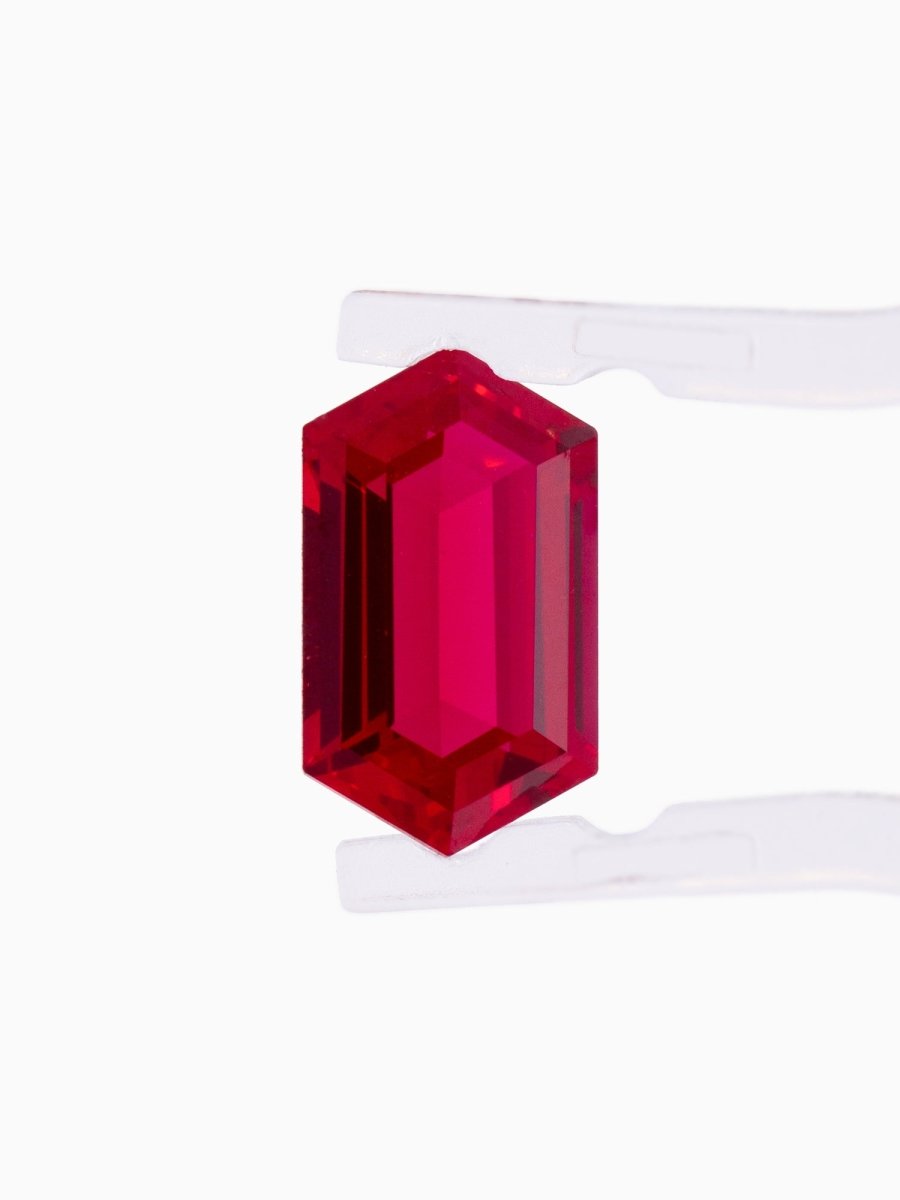 Red gemstone on a white background