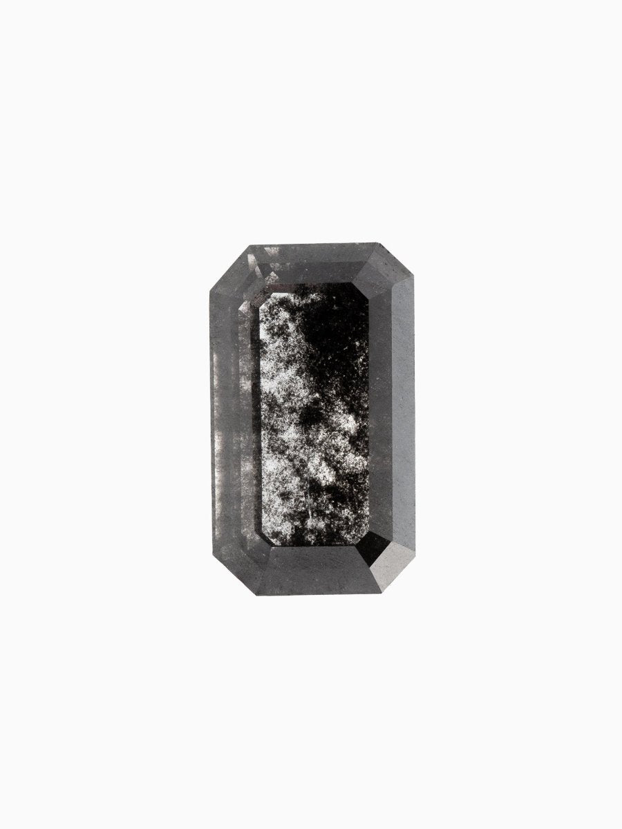 face view of loose lab-grown emerald-cut salt pepper diamond gemstone