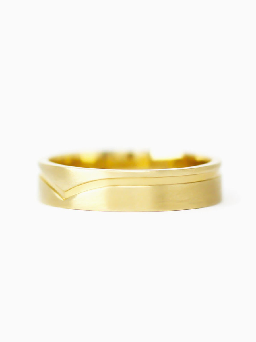 Gold ring on a white background