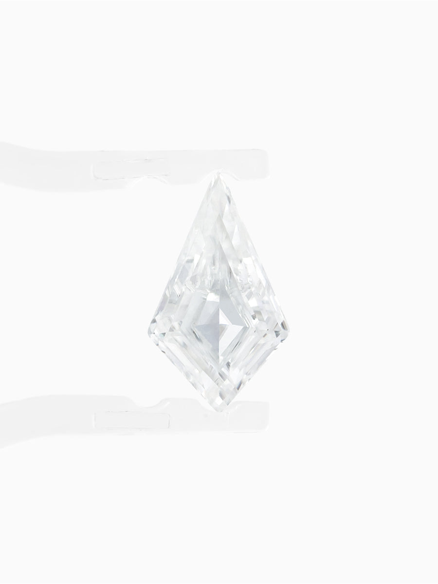 face view of clear moissanite kite held by tweezers to show light shining through