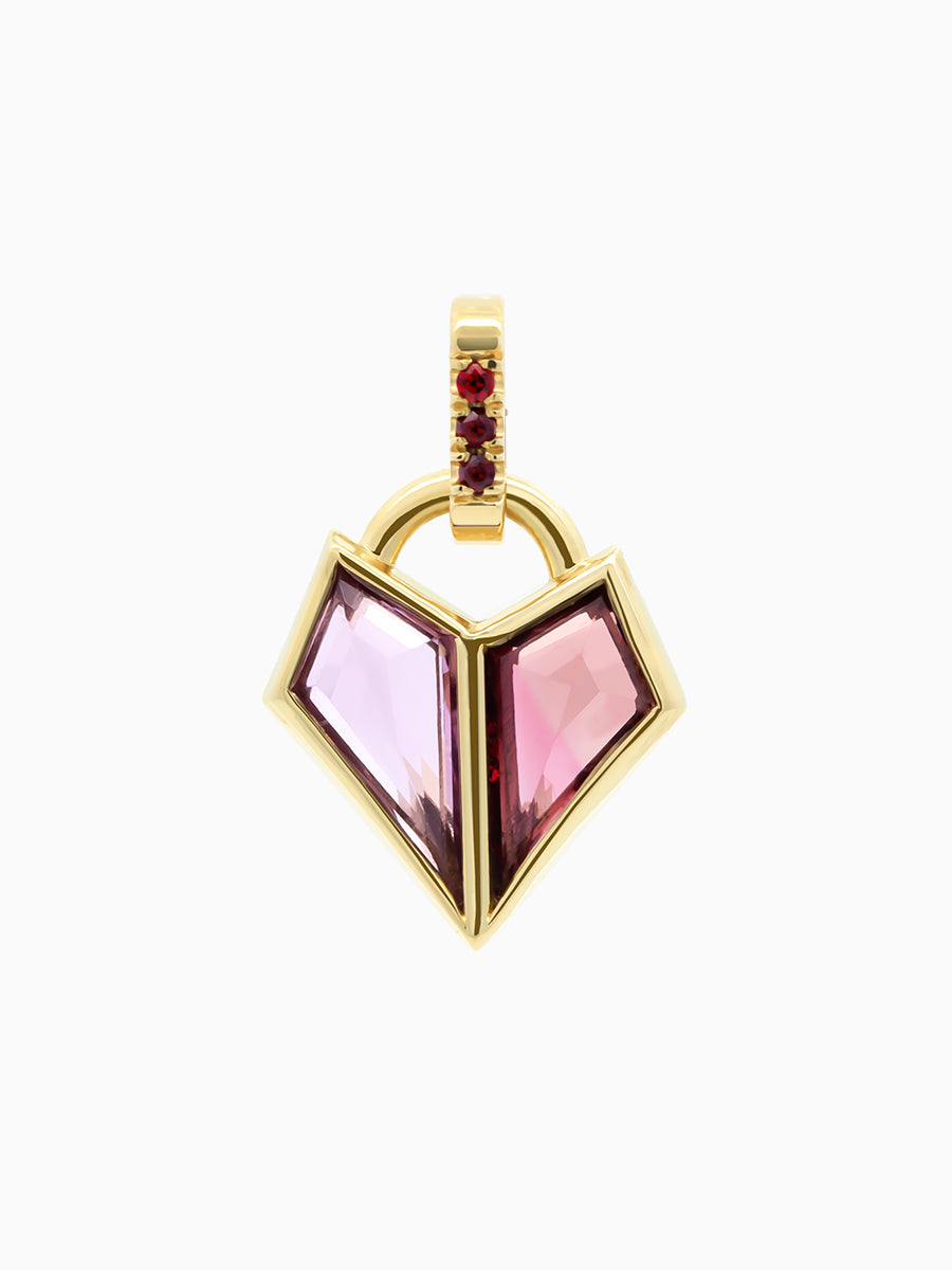 0.93 Total Carat Charm in yellow gold with two pink kite-cut spinels forming a heart and red garnet accents on white background.