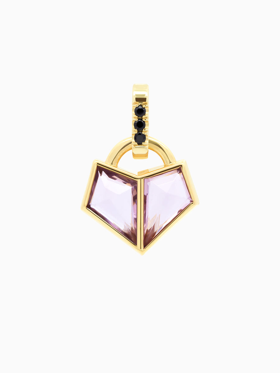 0.93 Total Carat Charm in yellow gold with two pink kite-cut spinels forming a heart and black onyx accents on white background.