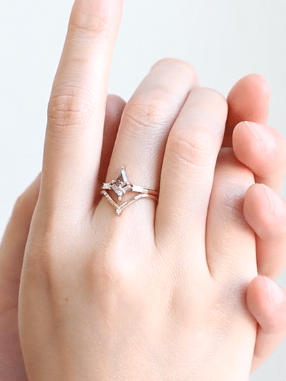 Kite salt and pepper diamond engagement ring in 14k rose gold with baguette and round diamonds inspired by the art deco style and minimalism.