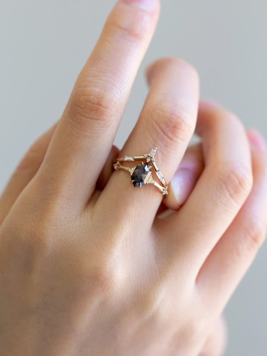 Unique art deco styled hexagon salt and pepper diamond engagement ring in 14k rose gold with smaller round diamonds.