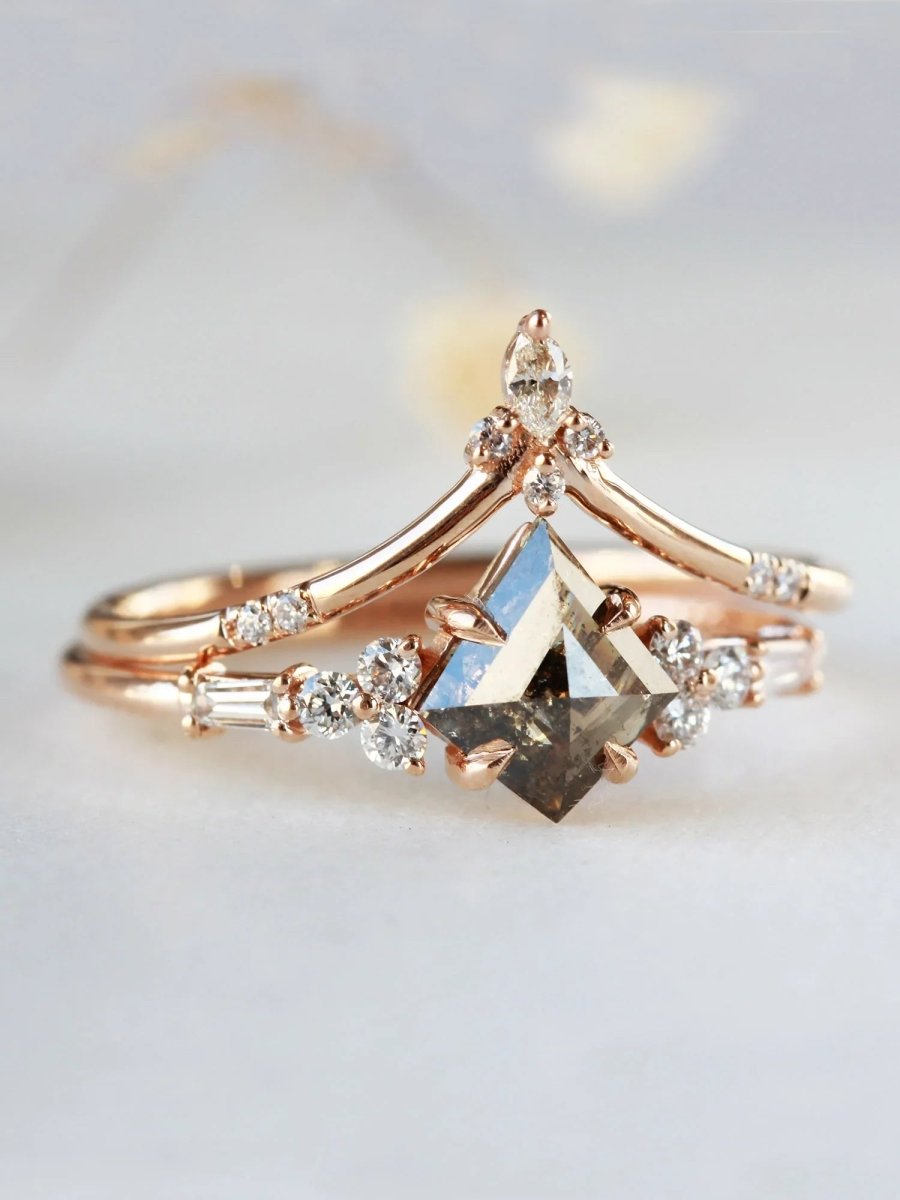 3/4 view of petite ring with galaxy kite salt and pepper diamond and trefoil melee accents stacked with chevron band.