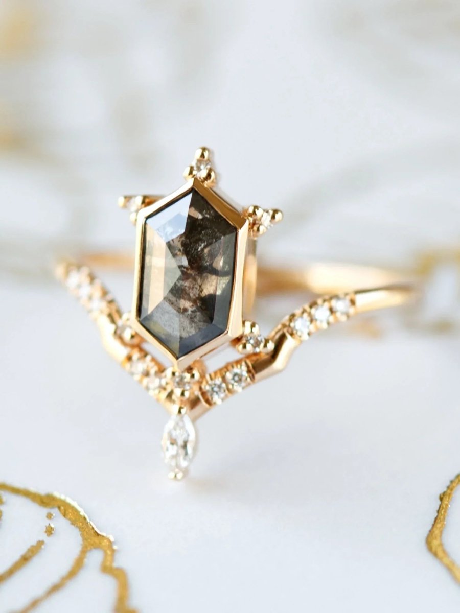 Unique art deco styled hexagon salt and pepper diamond engagement ring in 14k rose gold with a marquise and round diamonds.