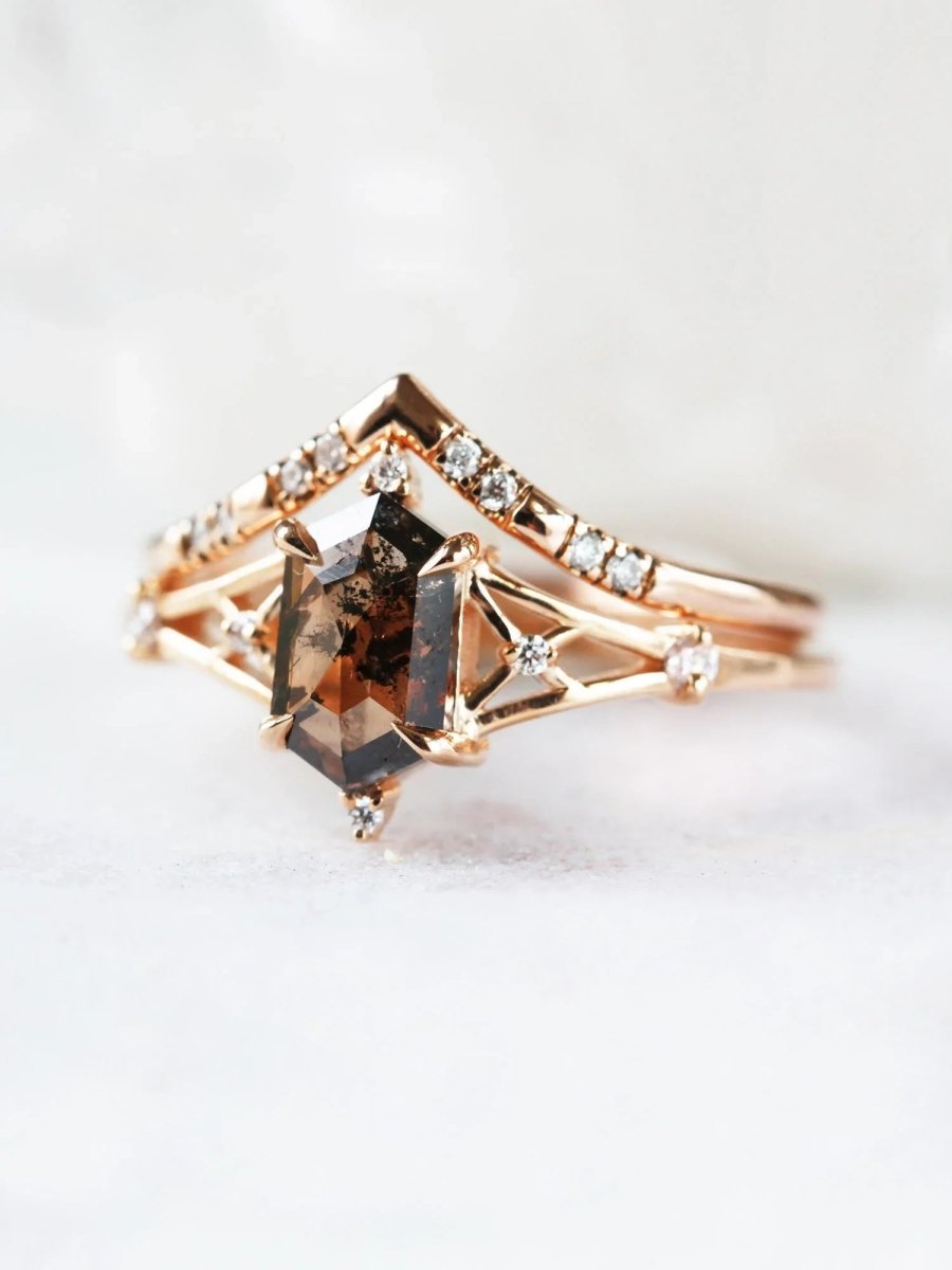Hexagon salt and pepper diamond engagement ring in 14k rose gold with smaller and round diamonds inspired by the art deco style and minimalism.