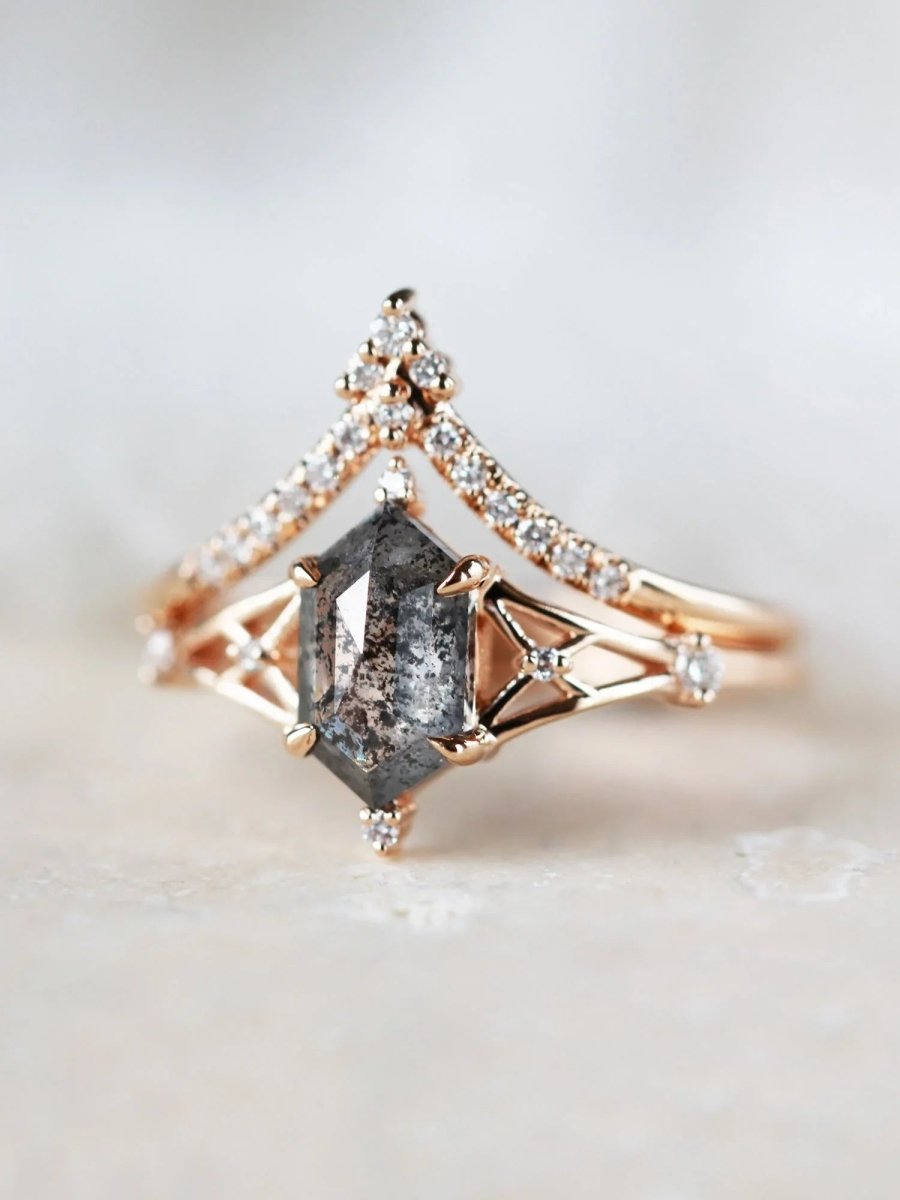 Hexagon salt and pepper diamond engagement ring in 14k rose gold with smaller and round diamonds inspired by the art deco style and minimalism.