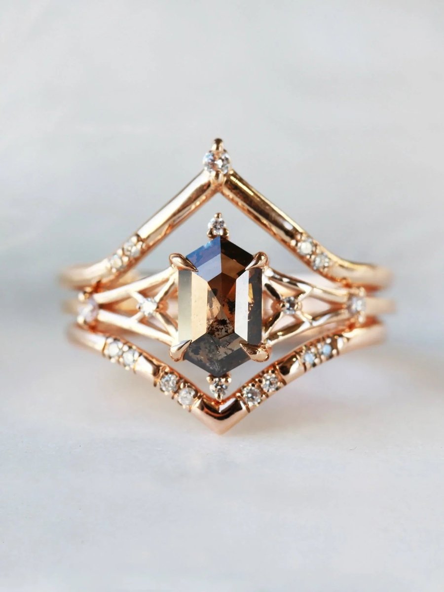 Hexagon salt and pepper diamond engagement ring in 14k rose gold with smaller and round diamonds inspired by the art deco style and minimalism.