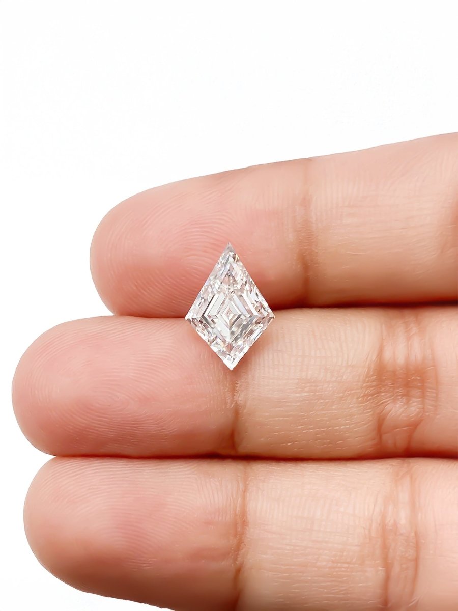 Radiant cut sustainable lab grown kite diamond on a white background on fingers for scale
