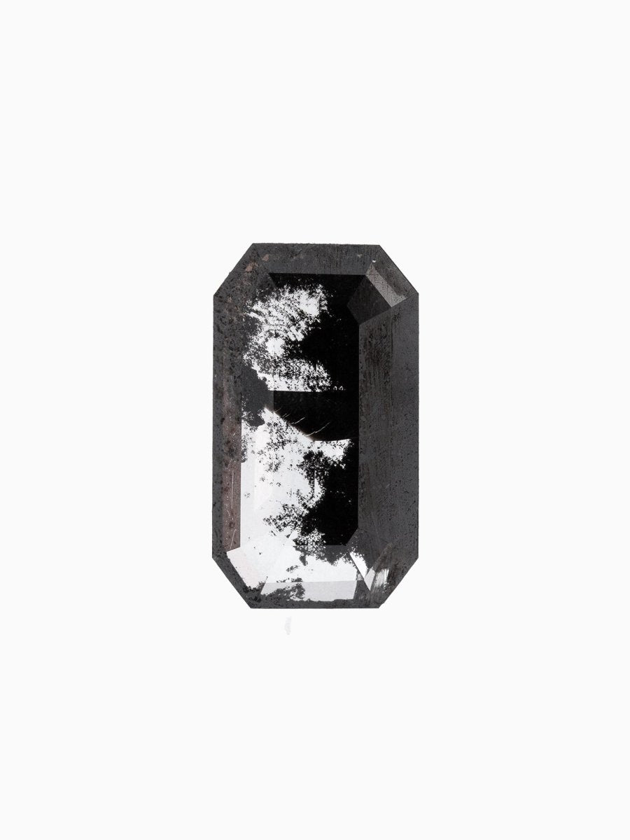 face view of loose lab-grown emerald-cut salt pepper diamond gemstone