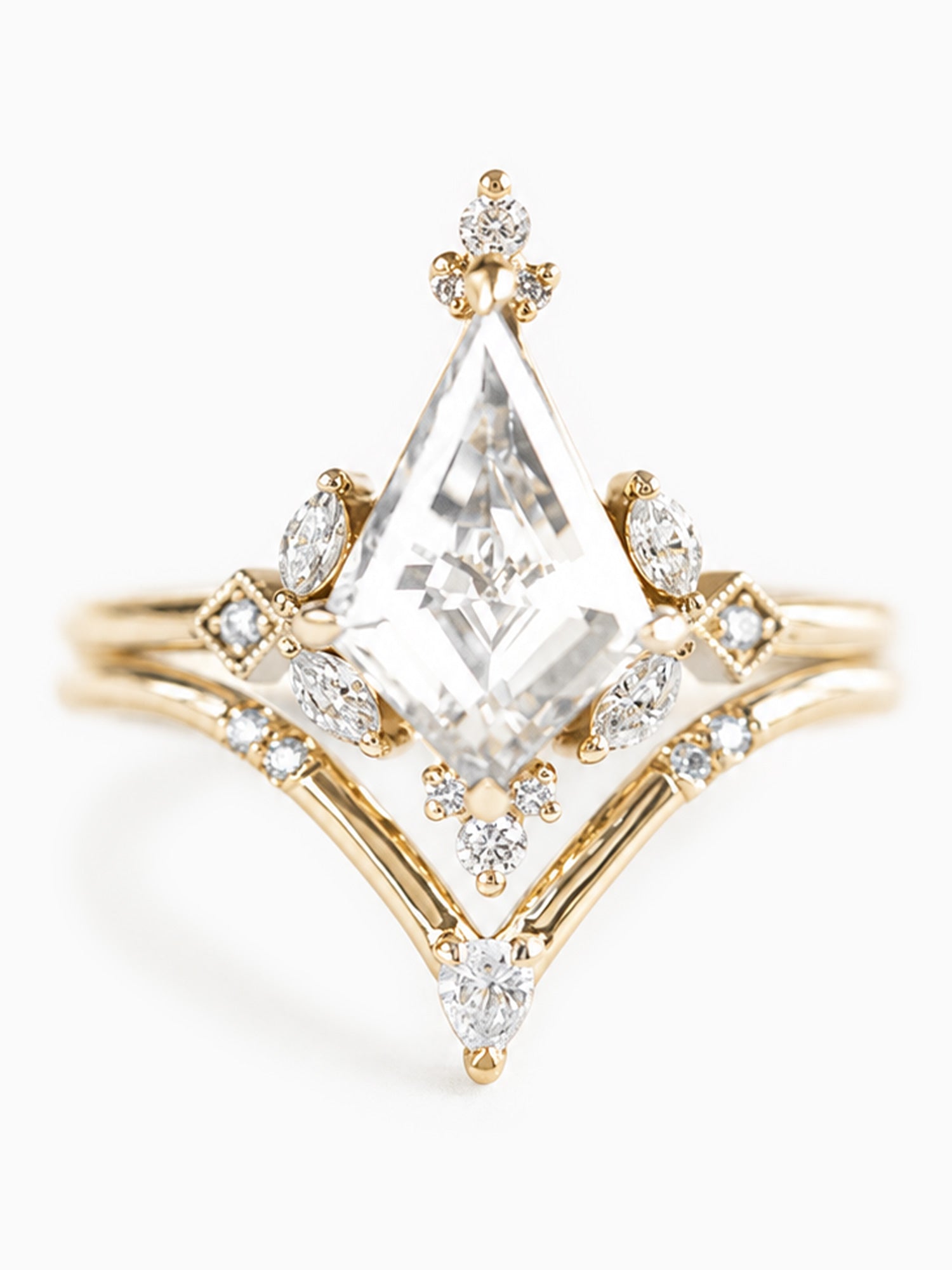 Gold ring with a large diamond and smaller diamonds on a white background