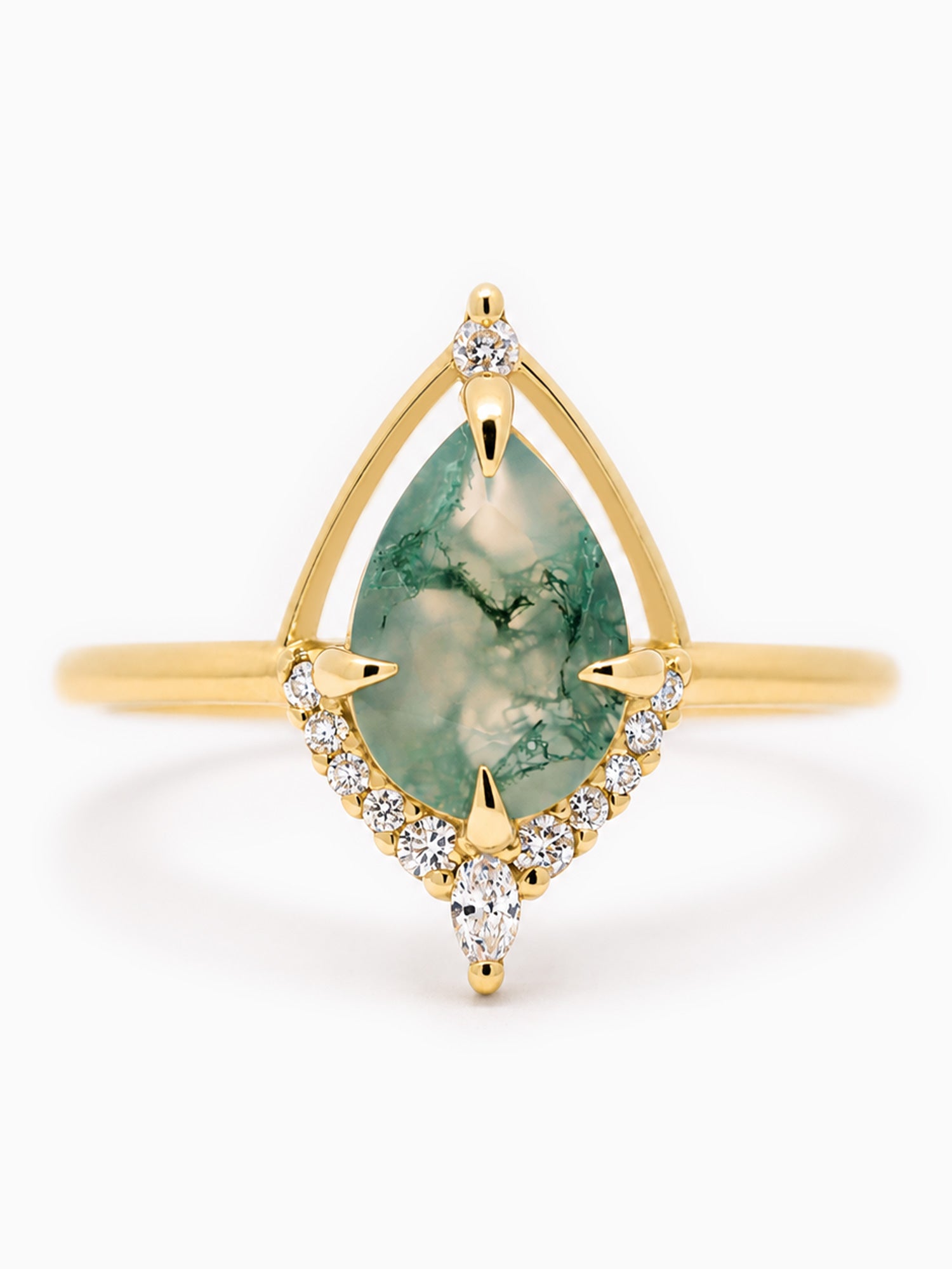 Gold ring with a green gemstone and small diamonds on a white background