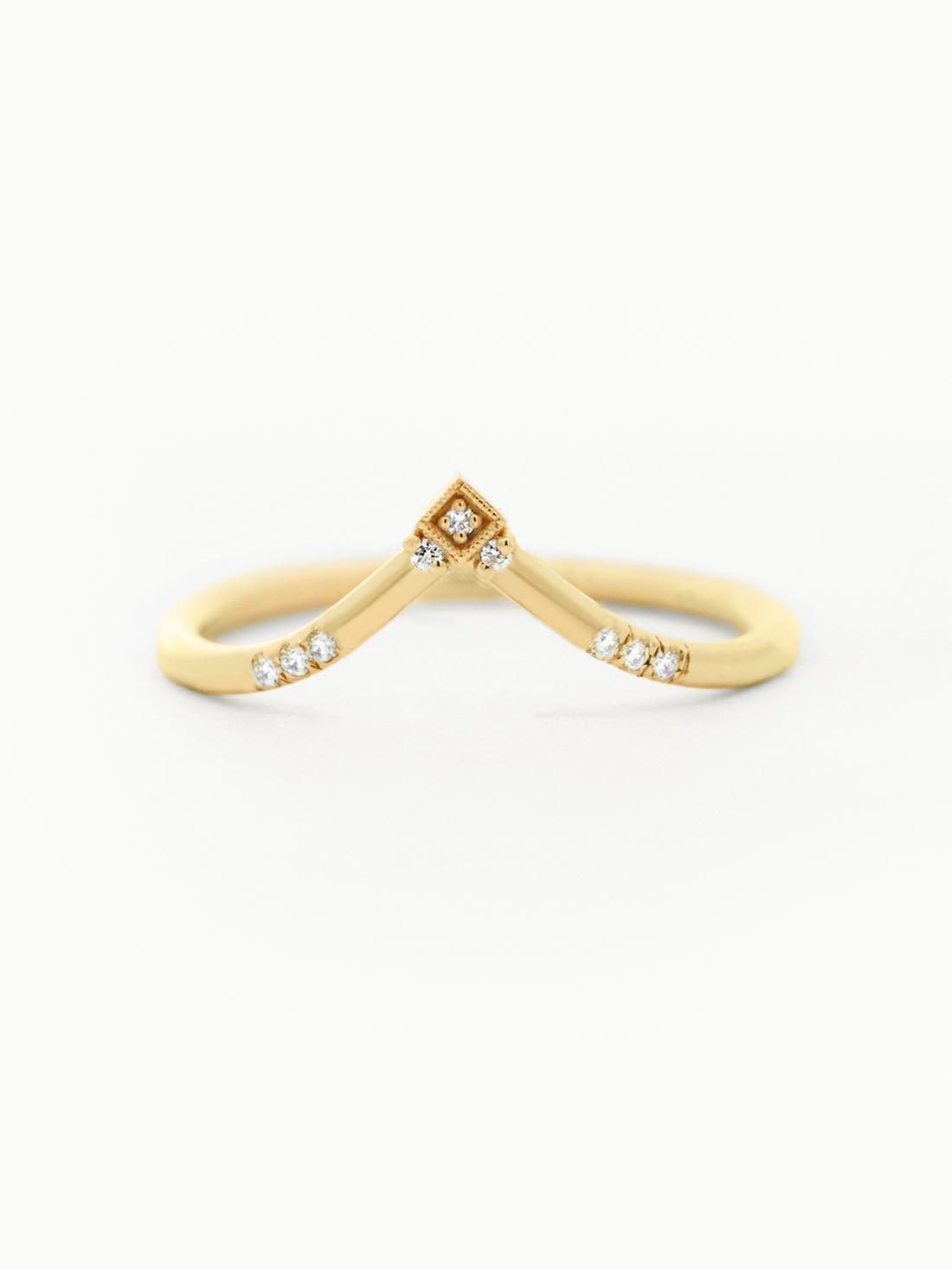 Modern geometric engagement band in 14k yellow gold with a symmetrical design in round diamond placements for a contemporary look.