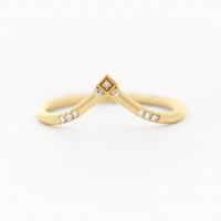 Modern geometric engagement band in 14k yellow gold with a symmetrical design in round diamond placements for a contemporary look.