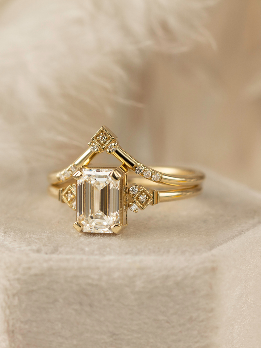 The Mia ring, a timeless emerald-cut design with vintage charm and delicate beauty. Crafted for elegance, its petite silhouette radiates effortless brilliance—perfect for those who exude grace and sophistication.