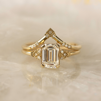 The Mia ring, a timeless emerald-cut design with vintage charm and delicate beauty. Crafted for elegance, its petite silhouette radiates effortless brilliance—perfect for those who exude grace and sophistication.