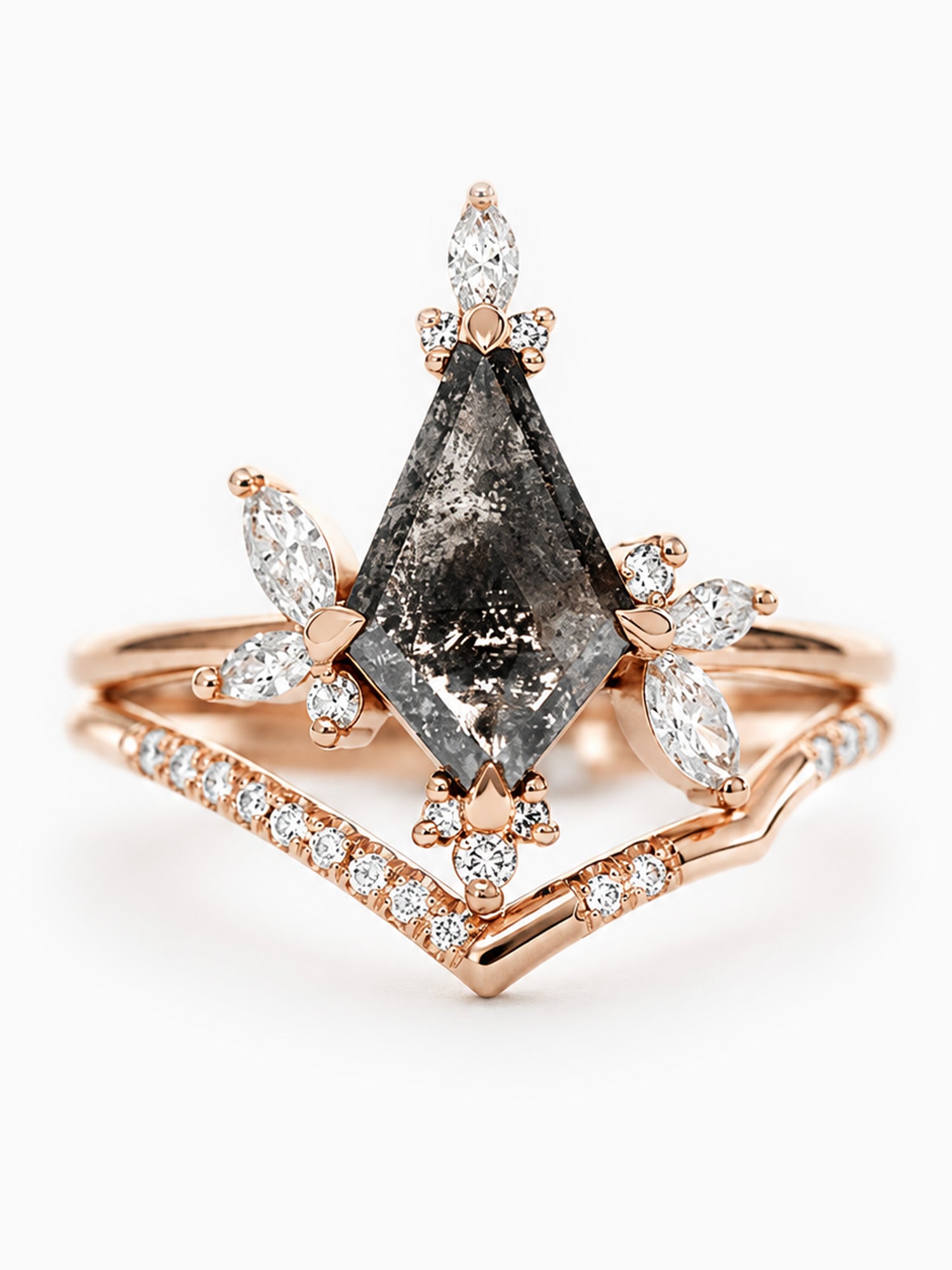 Rose gold ring with a large diamond and smaller diamonds on a white background