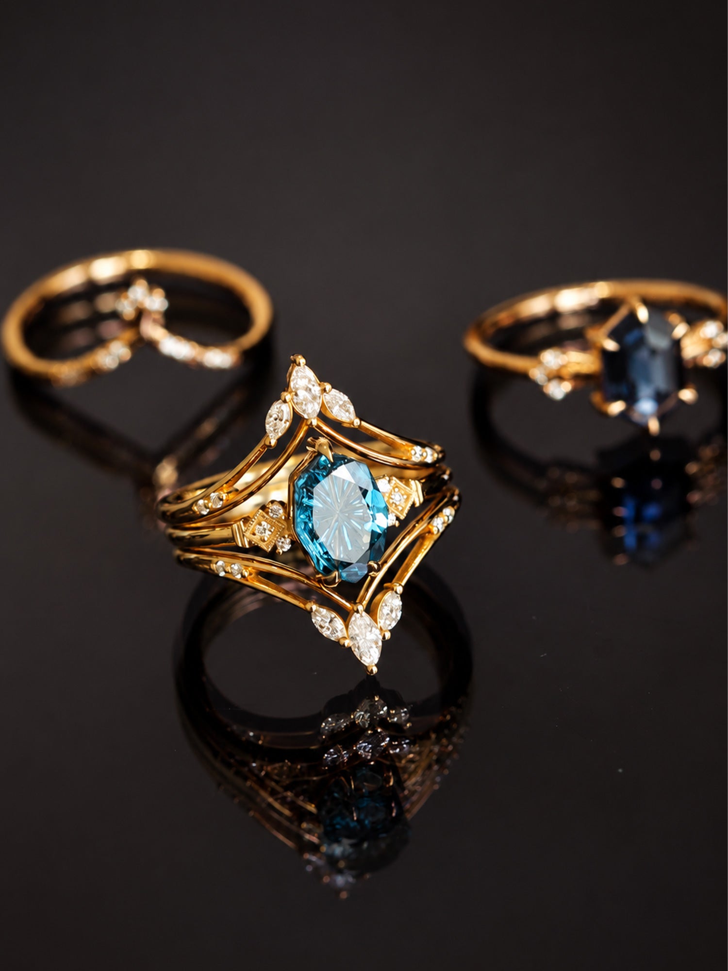 14K Yellow gold engagement ring black background fine jewelry concept photo