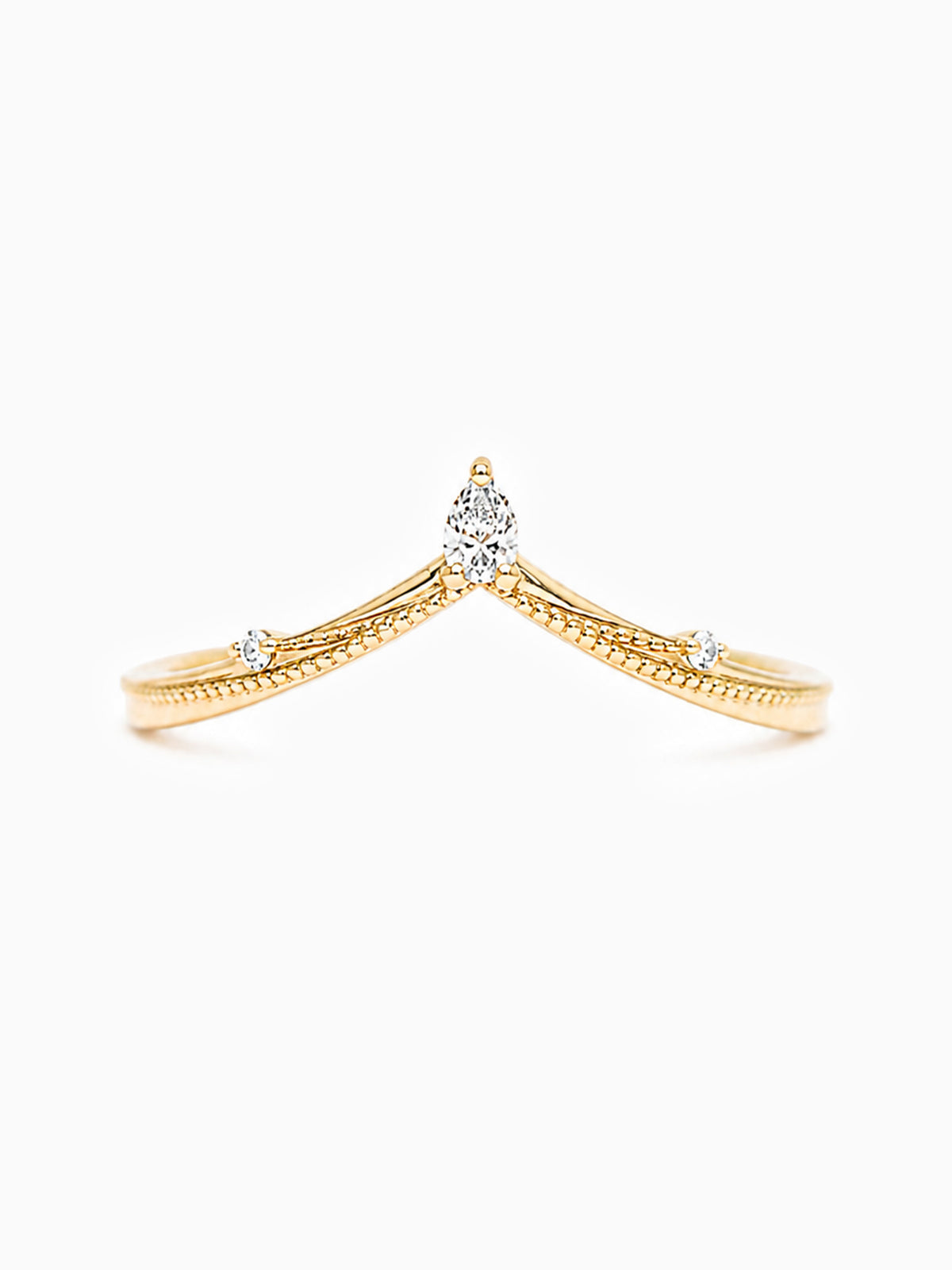 A delicate gold ring with a V-shaped split design, featuring a pear-cut center stone and small round stones set along the band, shown on a plain white background.