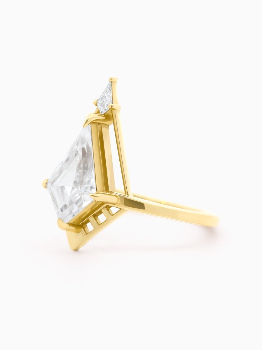 Three-quarter view of Atria Ring showing floating kite Moissanite and petite kite crown accent
