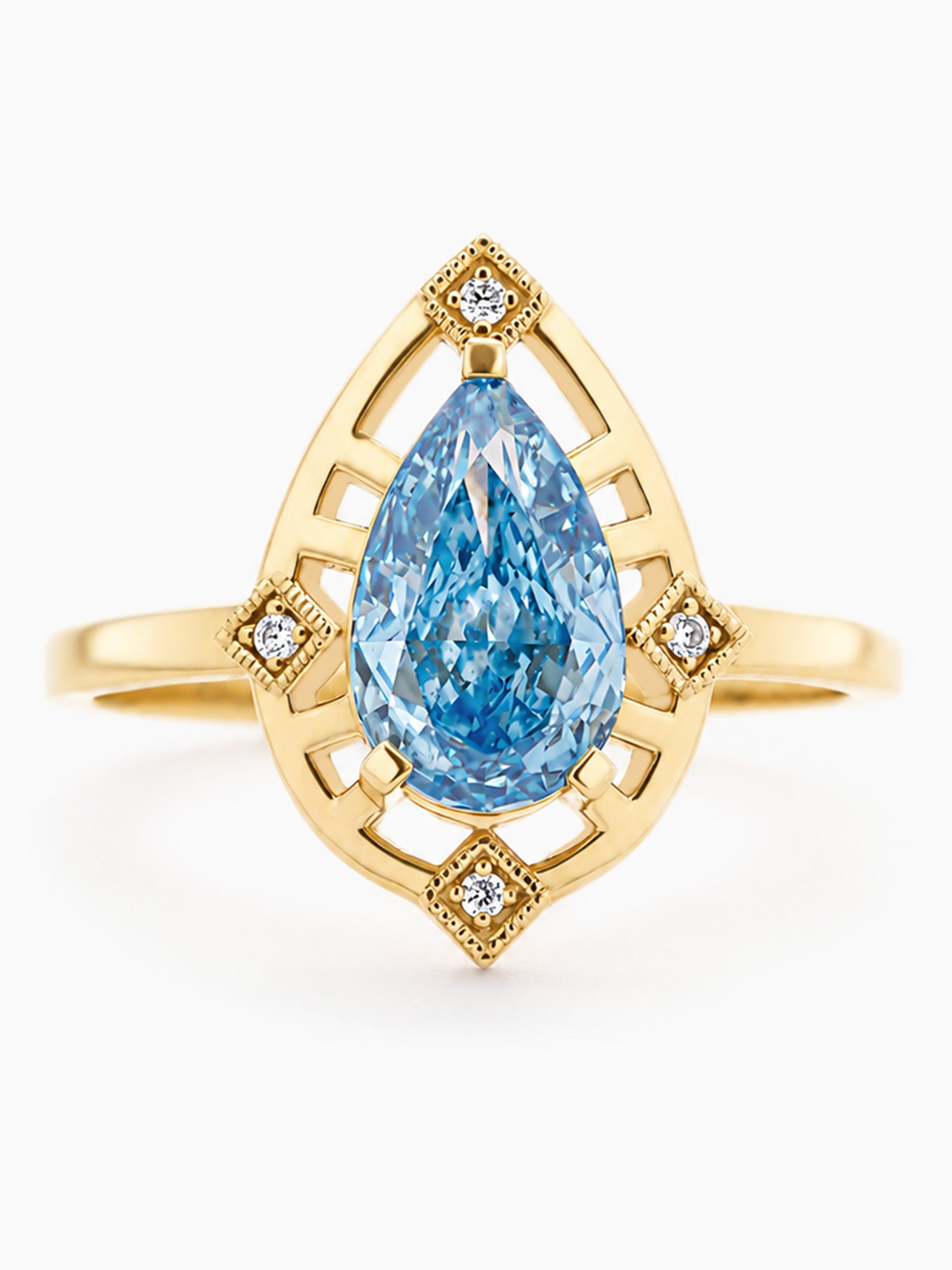 Gold ring with a pear-shaped blue gemstone and diamond accents on a white background