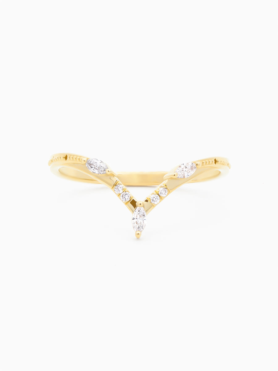 Chevron wedding  band with milgrain detailing and series of melee diamonds, face view