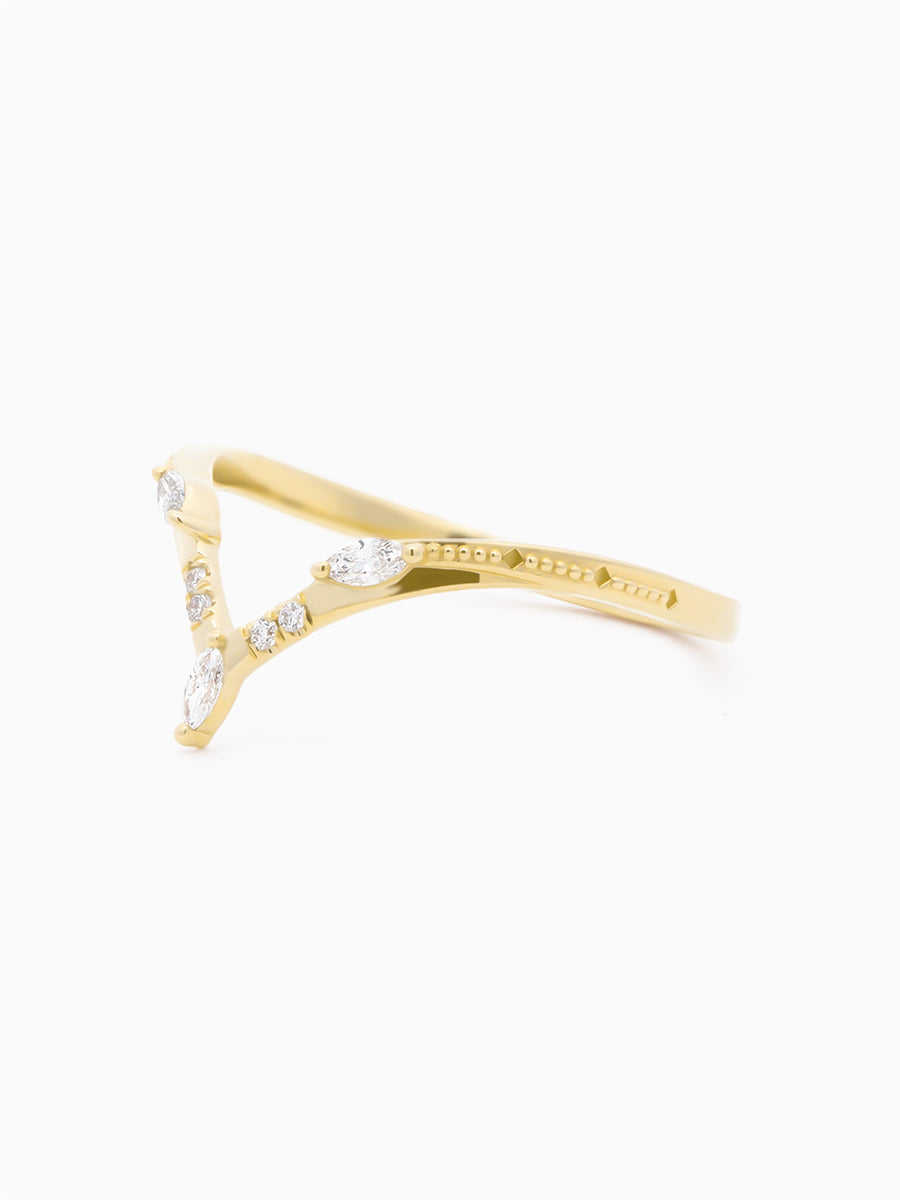 Chevron wedding  band with series of melee diamonds, 3/4 view to show series of milgrain details