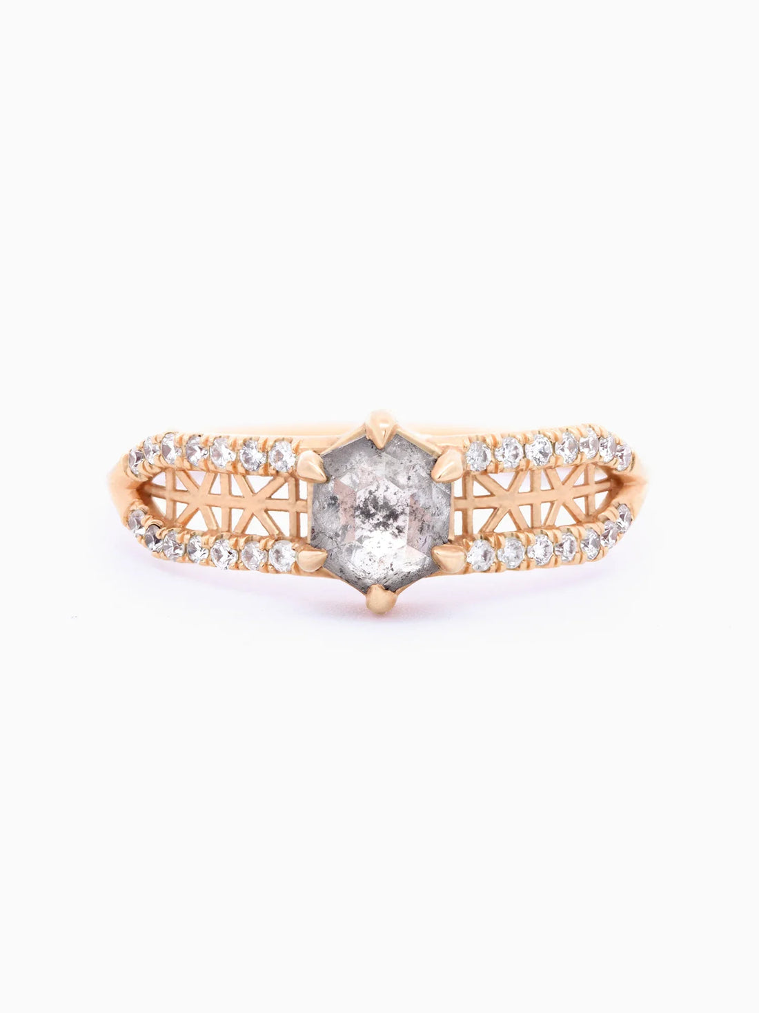 Face view of contemporary architectural engagement ring with split shank, lattice detail, pave melee diamonds, and claw-pronged hexagon salt pepper diamond