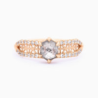 Face view of contemporary architectural engagement ring with split shank, lattice detail, pave melee diamonds, and claw-pronged hexagon salt pepper diamond