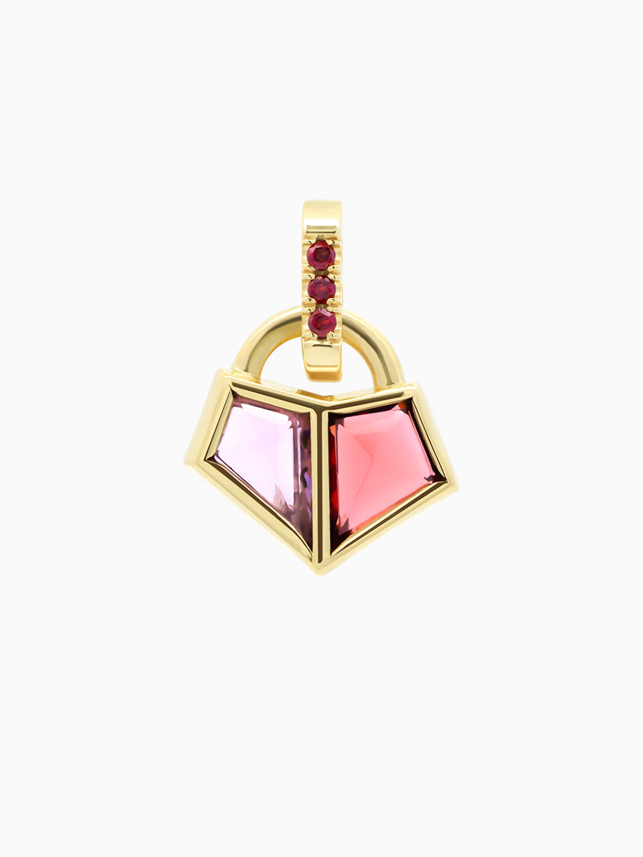 0.93 Total Carat Charm in yellow gold with two pink kite-cut spinels forming a heart and red garnet accents on white background.