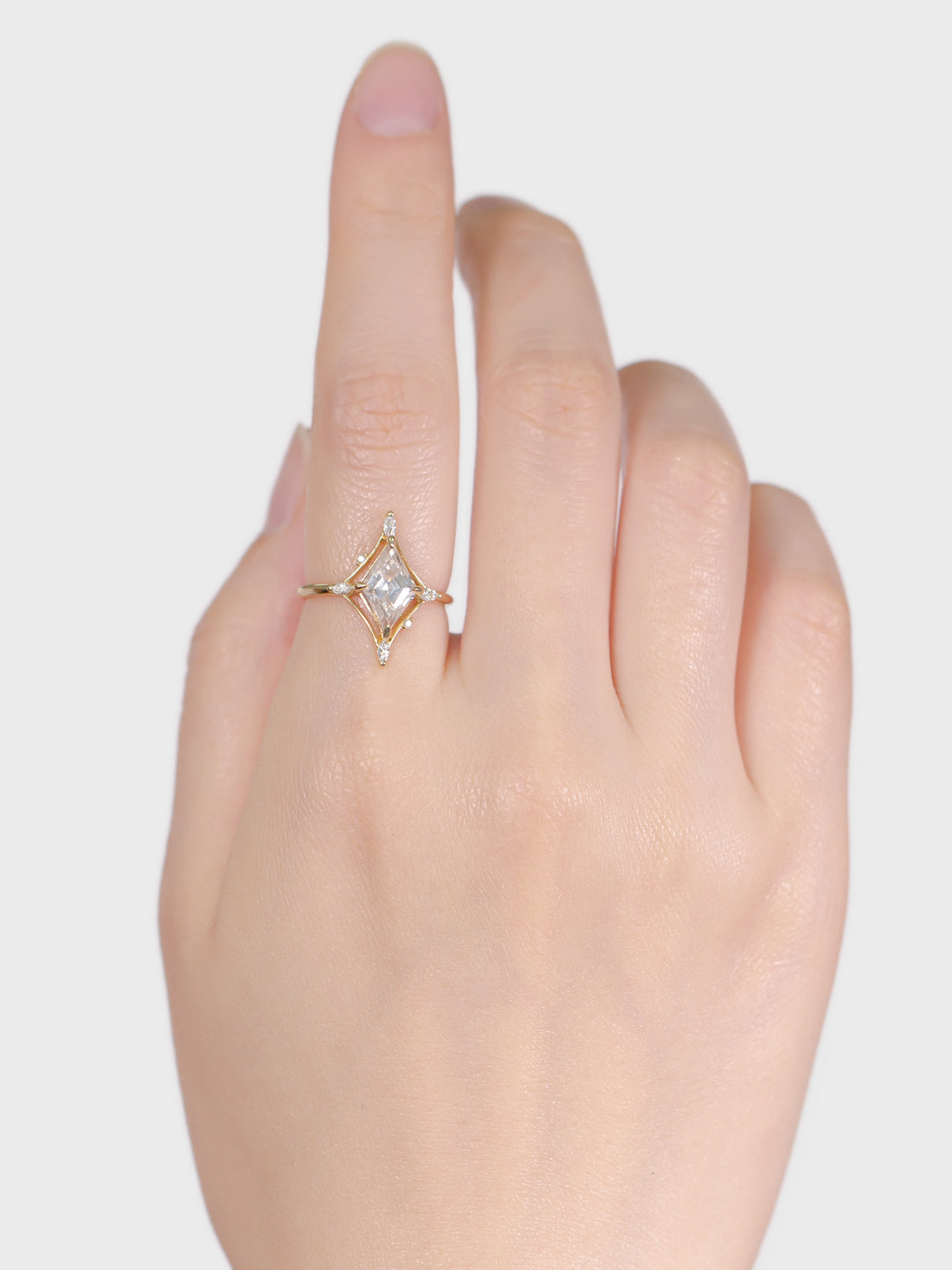hiddenspace-jewelry-engagement-rings-dakota-moissanite-diamond-14k-yellow-gold-hand-1