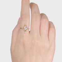 hiddenspace-jewelry-engagement-rings-dakota-moissanite-diamond-14k-yellow-gold-hand-1