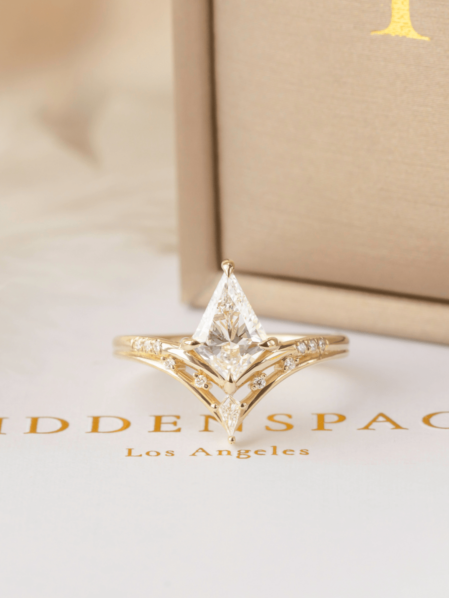 Gold ring with a diamond on a 'Hidden Space Los Angeles' box