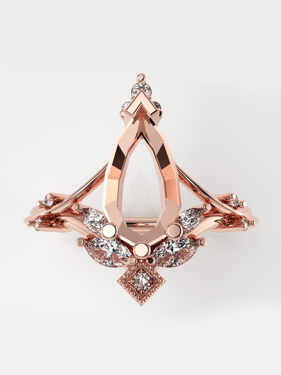 A rose gold ring without centerstone, surrounded by intricate designs and set against a white background.