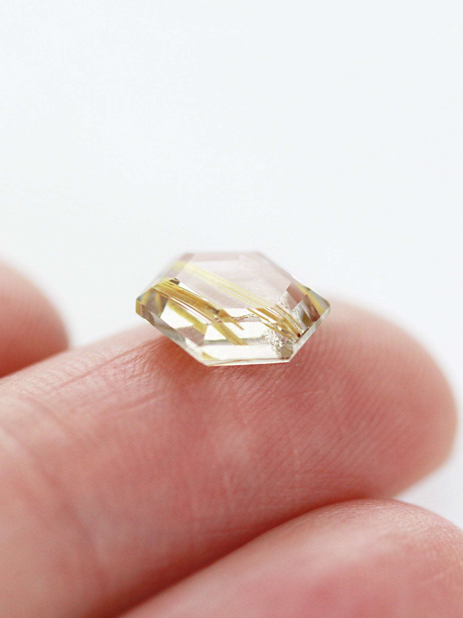 1.93CT Rutilated Quartz Inventory SKU RQHEX-12