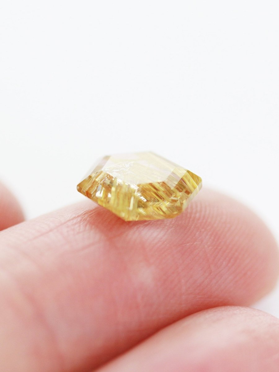 1.94CT Rutilated Quartz Inventory SKU RQHEX-11