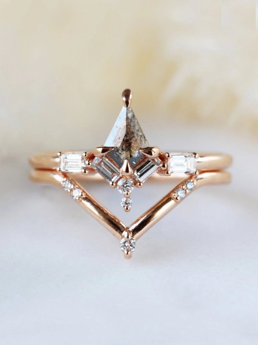 Kite salt and pepper diamond engagement ring in 14k rose gold with baguette and round diamonds inspired by the art deco style and minimalism.