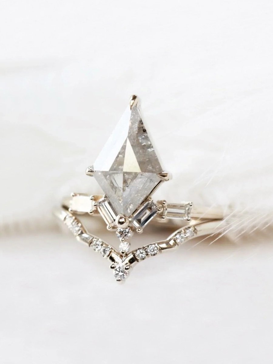 Kite salt and pepper diamond engagement ring in 14k rose gold with baguette and round diamonds inspired by the art deco style and minimalism.