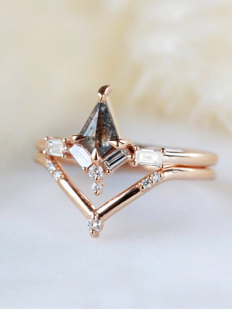Kite salt and pepper diamond engagement ring in 14k rose gold with baguette and round diamonds inspired by the art deco style and minimalism.