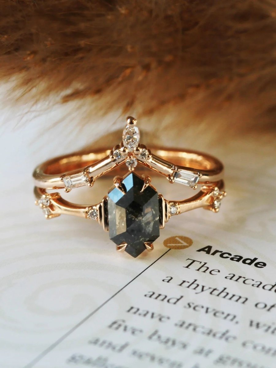 Unique art deco styled hexagon salt and pepper diamond engagement ring in 14k rose gold with smaller round diamonds.