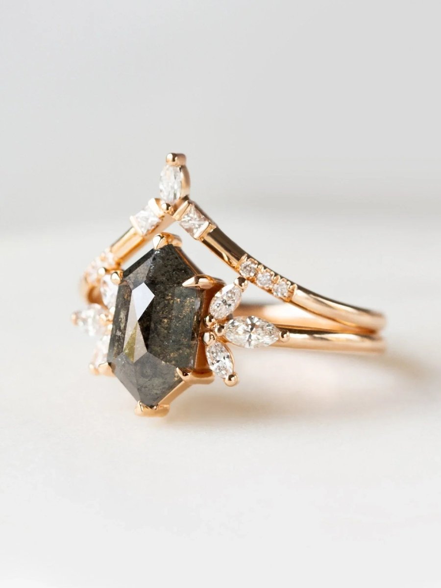 Art deco minimalistic hexagon salt and pepper diamond engagement ring in 14k rose gold with six smaller marquise diamonds with matching band.