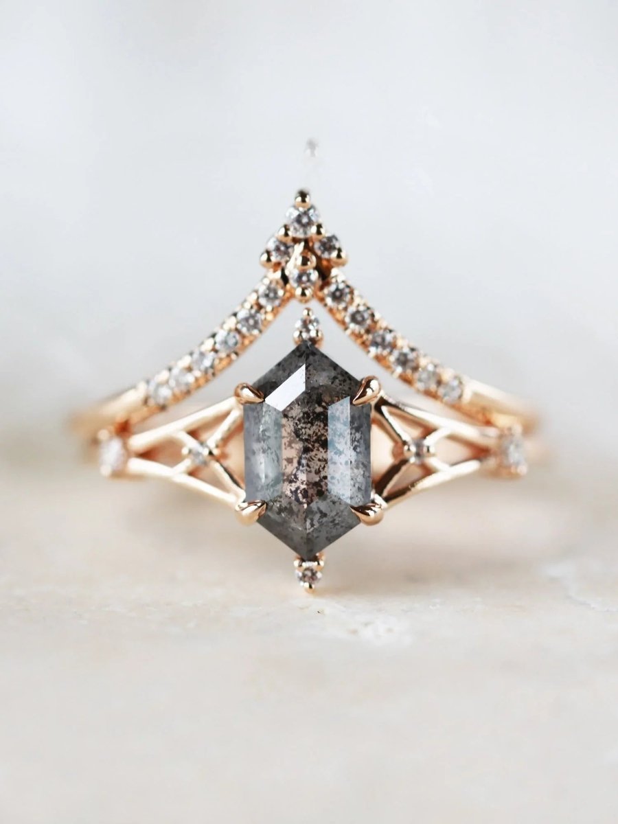 Hexagon salt and pepper diamond engagement ring in 14k rose gold with smaller and round diamonds inspired by the art deco style and minimalism.