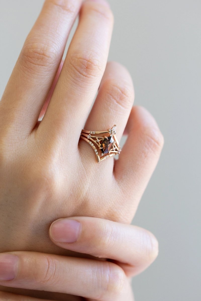 Hexagon salt and pepper diamond engagement ring in 14k rose gold with smaller and round diamonds inspired by the art deco style and minimalism.