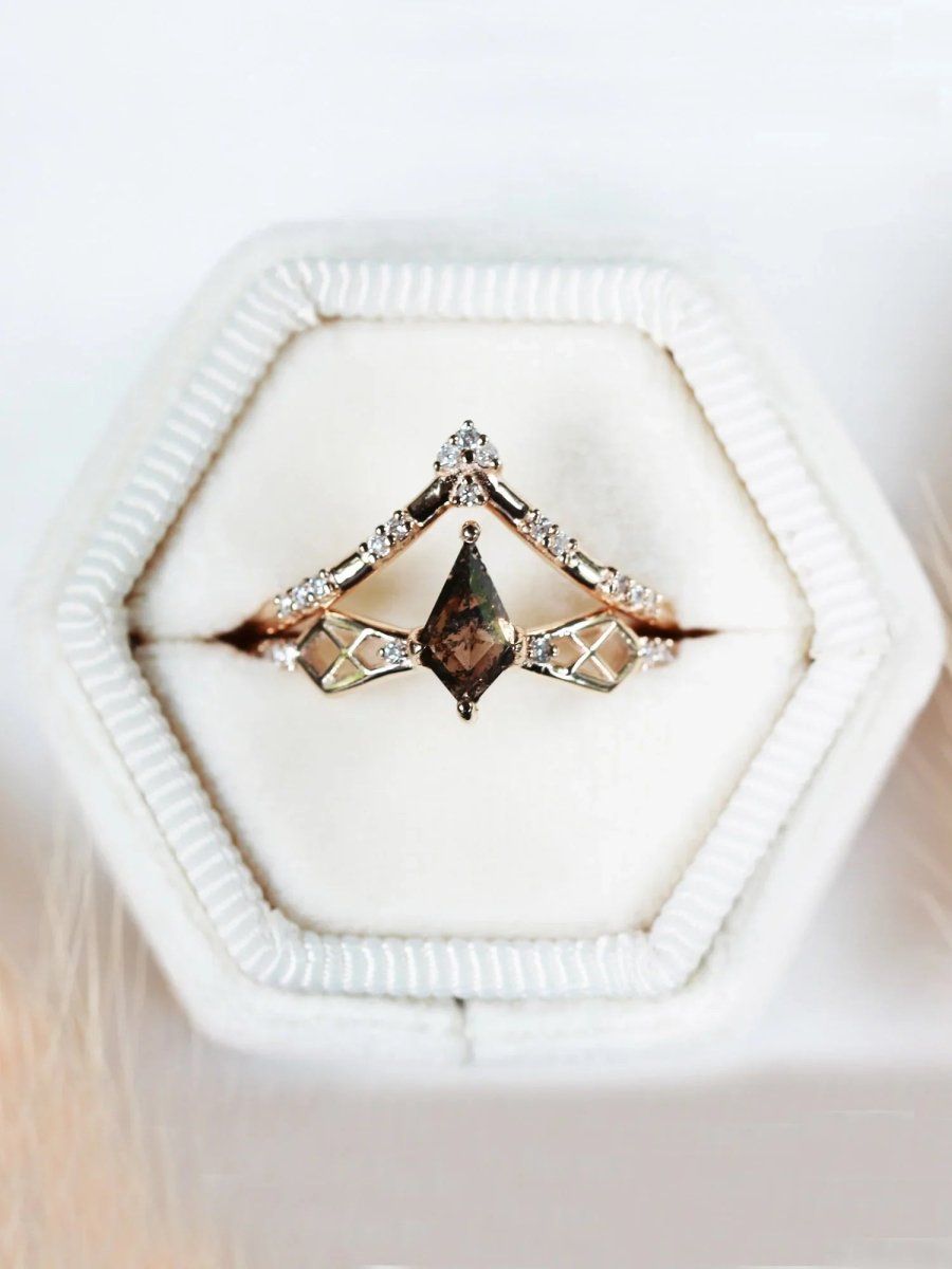 Modern Art Deco kite engagement ring with geometric latticed shoulders, round melee diamonds, paired with chevron wedding band in white ring box