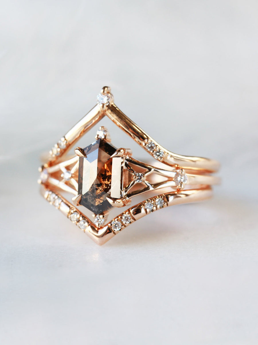 Hexagon salt and pepper diamond engagement ring in 14k rose gold with smaller and round diamonds inspired by the art deco style and minimalism.