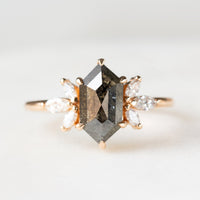 Art deco minimalistic hexagon salt and pepper diamond engagement ring in 14k rose gold with six smaller marquise diamonds.