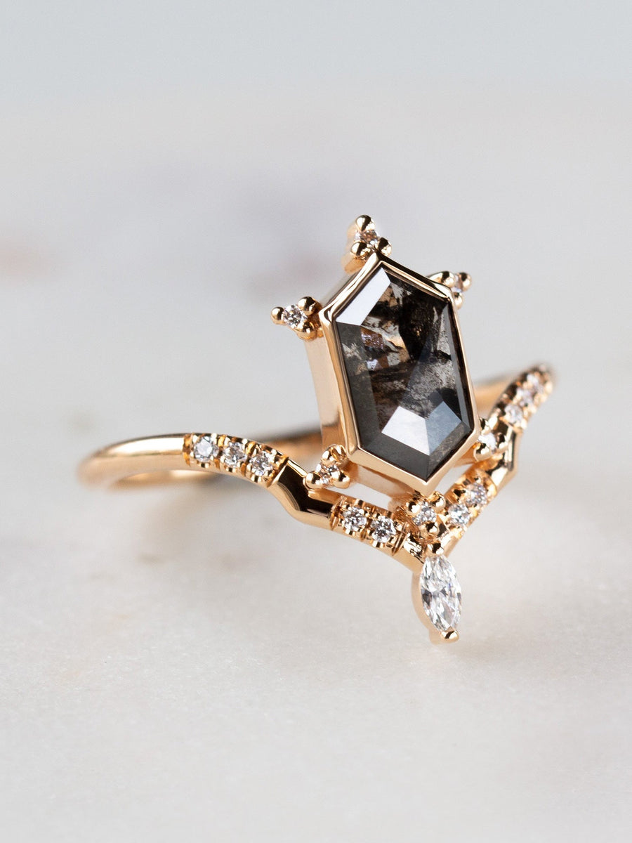 Unique art deco styled hexagon salt and pepper diamond engagement ring in 14k rose gold with a marquise and round diamonds.